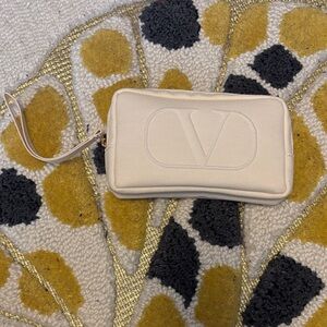 Valentino Beauty Cream Wristlet with Embossed V Logo
